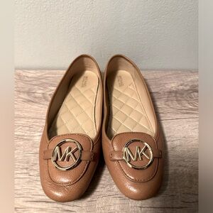Women’s Michael Kors tan flats with gold hardware